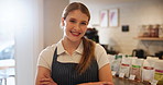 Portrait, smile and confident as waitress in cafe for hospitality service, restaurant management and retail store. Happy, woman and arms crossed for startup business, server pride and coffee shop