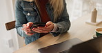 Woman, laptop and phone in cafe for texting with reading information, communication and remote work. Female person, computer and mobile in coffee shop for email notification, copywriting and research