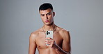 Influencer, man and selfie for fitness in studio on grey background for social media campaign. Topless person, portrait and face of model with confidence, picture or chain for live streaming or vlog