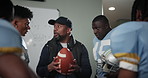 Black man, football coach and meeting with team for game, match or break in half time, rest or recovery. Frustrated mentor or sports trainer talking to group of athletes or players for motivation