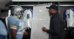 Sports, coach and man with strategy on whiteboard for football, tactic and game plan in locker room. Drawing, training and manager with marker for match briefing, team and discussion of formation