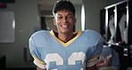 Man, American football and happy in locker room for sport, face and ready for game in competition. Excited person, athlete and player with smile in portrait for contest, club and franchise in Florida