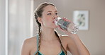 Woman, health and drinking water for yoga workout with natural nutrition, wellness and break in studio. Female person, thirsty and liquid hydration for pilates training, energy recovery and self care