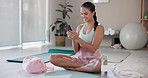 Relax, fitness and woman on floor with phone for break, online meme and check exercise app. Girl, mobile and smile on mat for funny video, pilates blog and web payment for gym membership in studio