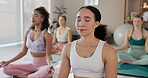 Meditation, yoga and zen with women on floor of studio for mental health, mindfulness or wellness. Breathing, calm and inner peace with friends in class for balance, holistic health or pilates