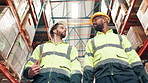 Logistics, discussion and men in warehouse for planning, supply chain or inventory management. Teamwork, inspection and low angle of people in plant together for quality control in cargo distribution