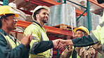 Handshake, people and achievement in warehouse for collaboration, trust and success with applause. Shaking hands, celebration and logistics industry for intro, supply chain and cooperation together