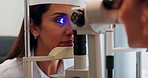 Eye, test and woman at machine with light for medical assessment, evaluation or retina check. Glaucoma, led glow and girl in exam for vision, focus or eyesight scan with health consultant at clinic