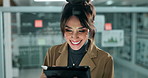 Woman, typing and happy with tablet at office in night, thinking and problem solving at financial job. Person, touchscreen and fintech app with smile, ideas or research for trading on stock market