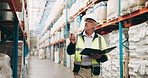 Warehouse, inspection and man with documents for shipping, delivery and inventory in factory. Ecommerce, distribution and worker with report and shelves for packages, manufacturing and supply chain