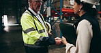 Business people, team and handshake with documents at warehouse for quality control or logistics. Businessman and woman shaking hands with checklist for storage, supply chain or distribution at depot