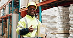 Happy black man, supplier and box with thumbs up at warehouse for storage, delivery or inspection in logistics. Portrait of young African or male person with smile, like emoji or yes for supply chain