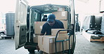 Black man, supplier and box with trolley for delivery, supply chain or logistics by van. Young African, male person or courier guy packing stock on lift in transportation service, shipping or storage