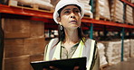 Woman, inspection and checking storage with tablet at warehouse for logistics or quality control. Female person or contractor looking at inventory on shelves or technology for supply chain at depot