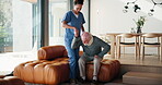 Senior man, nurse and walking support in home for person with disability, healthcare and neck injury. Elderly care, empathy and spinal pain in house for rehabilitation, osteoporosis and parkinson