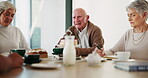 Lunch, talking and old man in group in house, reunion and cake for tea party, drink and dining room. Home, chat and elderly people in retirement, coffee and conversation with friends for nostalgia