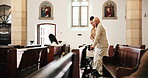 Senior, man and walking with caregiver in church for walker assistance, religion or christian service. Elderly person, woman or mobility support in chapel for spiritual sermon and faith to praise God