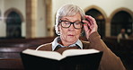 Faith, prayer and old woman in church with bible, peace and spiritual connection to Christian God. Thinking, religion and elderly person in chapel with insight, worship and reading book in service