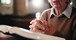 Bible, prayer and hands of old woman in church with faith, gratitude or spiritual respect in meditation. Praise, religion and elderly person in chapel with book for morning service, worship and peace