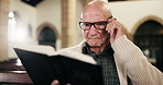 Bible, reading and old man in church with prayer, gratitude or spiritual faith in morning service. Praise, religion and elderly person in chapel with book for gospel inspiration, worship and peace