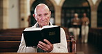 Bible, prayer and senior man in church with faith, gratitude or spiritual respect in meditation. Praise, religion and elderly person in chapel reading holy book for morning service, worship and peace