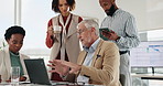 Laptop, talking and manager with business people in office for teamwork, training and collaboration. Corporate company, professional and boss with staff for research, website and feedback on computer