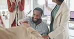 Office, applause and business people on laptop with fist bump for teamwork, collaboration and celebration. Corporate, computer and men and women clapping hands for success, victory and good news