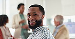 Business, man and face with smile in meeting in office with confidence, team and pride for finance career. Professional auditor, employee and happy portrait at corporate firm for workshop or training