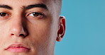 Closeup, face and man with skincare, cosmetics and dermatology on blue studio background. Portrait, model and person with grooming routine, mockup space and beauty with treatment and healthy skin