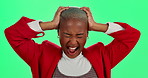 Frustrated, black woman and headache with stress on green screen in depression on a studio background. Young African, female person or model screaming with migraine in anxiety, pain or frustration