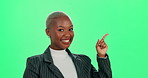 Happy woman, portrait and pointing on green screen, studio or mockup background. Excited black businesswoman, smile and advertising business promotion, product placement or show choice approval