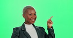 Excited woman, smile and pointing on green screen, studio or mockup background. Happy black businesswoman, portrait and advertising business promotion, product placement or show choice approval