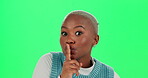 Black woman, face and shush on green screen in studio for gossip, privacy information and confidentiality of news. Person, hand gesture and secret or whisper, silent and quiet for announcement.