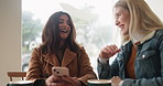 Women, friends and conversation with phone in cafe for showing photo album, online comment and bonding. Female people, talking and mobile for social media app, reading gossip and relax in coffee shop