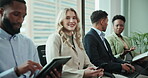 Business, candidates and waiting room in row for job interview at office with research, conversation and write notes. People, hiring process and smile for recruitment, career opportunity and prepare