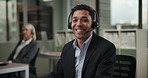 Face, happy and man in call center office for customer service, consulting and business crm. Male advisor or agent, inbound telemarketing and headphone for listening, communication and faq support.