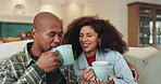 Couple, people and happy with coffee in home for bonding, love and support on sofa in living room. Relationship, lovers and smile or laughing on couch with fun for break, relax and chilling in lounge