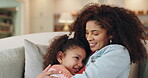 Mother, happy child and hug with comfort, trust and relationship in family home for bonding. Woman, girl and affection for love, compassion and soothing for development, growth and support in embrace