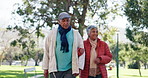 Happy, walking and mature couple in park for bonding, relationship and relax together. Love, retirement and senior man and woman outdoors together for wellness, health and commitment in nature