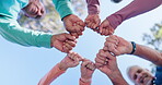 Huddle, fist or hands of people in park for fitness or support in outdoor workout, group or low angle. Healthy, strong or senior friends together for training goal, exercise or retirement community