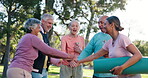 Coach, huddle or old people in park for fitness support in outdoor workout or group performance. Stack, happy or senior friends in nature together for training goal, exercise or retirement community