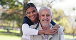 Face, hug and nurse with old man in park, smile and happiness with time together, nature and wellness. Portrait, professional or senior person with embrace, outdoor or caregiver with support or trust