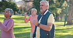 Exercise, running and smile with senior people in park together for cardio, mobility or wellness. Fitness, health and training with happy elderly group in garden or nature for retirement activity