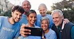 People, volunteer and happy in park with selfie for teamwork, collaboration and outreach program. Team building, outdoor and community service or work for charity, NGO and change in New York