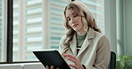 Business woman, tablet and scrolling on app for communication, news article or information in company. Female person, tech and connection in modern office, connection and reading on website or online