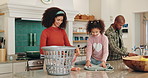 Laundry, family and mother with girl, father and chore with happiness, housekeeping and time together. House, parents and daughter in kitchen, cleaning and routine with care, hygiene and learning