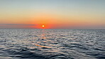 Water, horizon and sky at beach with sunrise for travel location, tropical island and holiday destination. Aerial, ripples and tide waves in Maldives for summer vacation, ocean scenery or environment