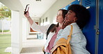 Happy, friends and women for selfie at school for education, photography and social media post at university lobby. Smile, students and girl with profile picture update, college memory and learning