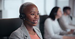 Call center, help and black woman with headset in office for customer service, online advice or telemarketing. CRM, contact us and consultant in discussion for communication, assistance or support 