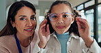 Portrait, woman and glasses for child, store and smile for fitting of girl, vision and happy for healthcare. Shopping, customer and kid with prescription eyewear in shop, helping and optician